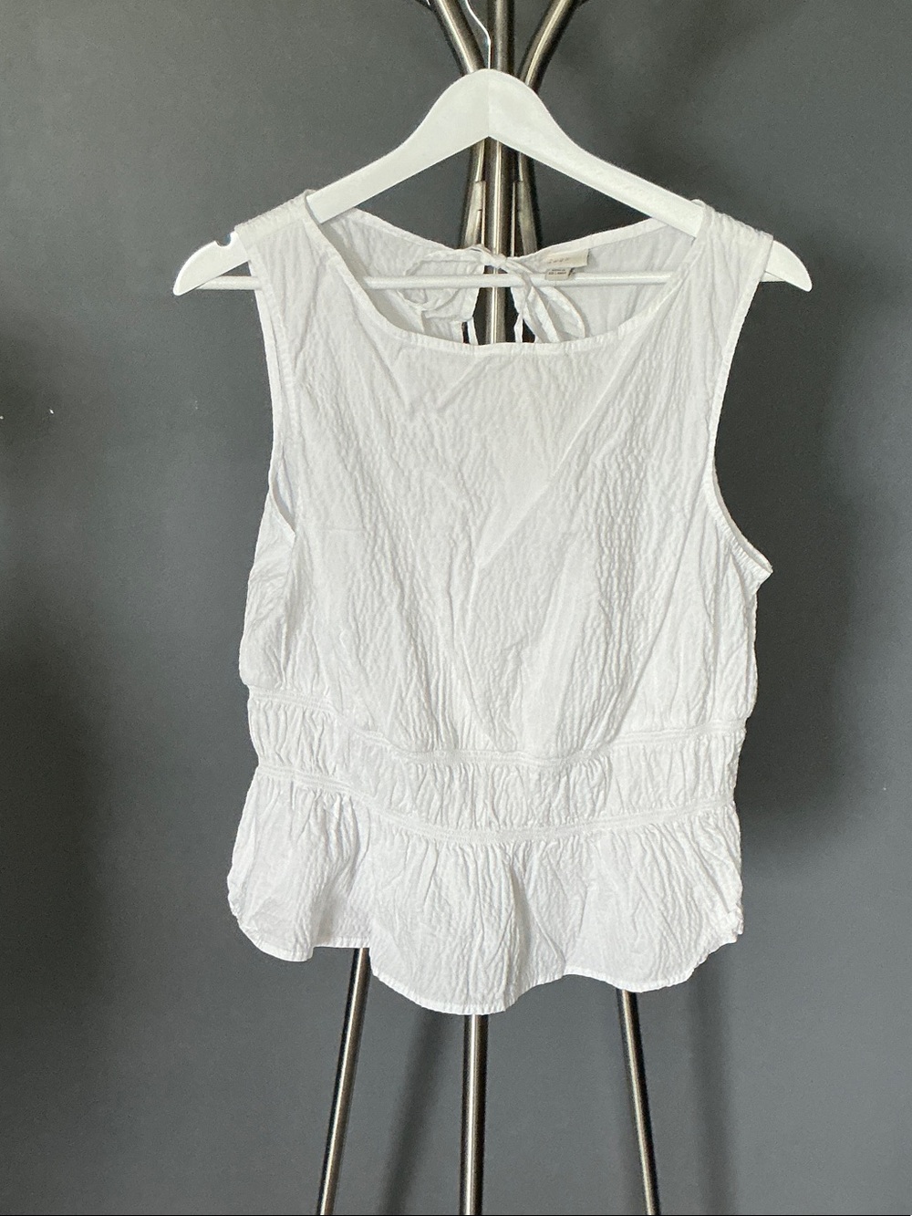 White Sleeveless Peplum Tank with Back Tie